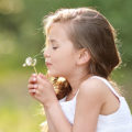 Portrait,Of,A,Beautiful,Little,Girl,With,Flowers