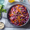 Red,Cabbage,Salad,,Coleslaw,In,A,Bowl.,Grey,Background.,Top